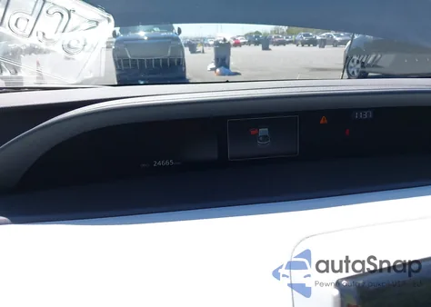 2022 Toyota Prius Prime Le z USA, uszkodzony, nr VIN JTDKAMFP3N3218022